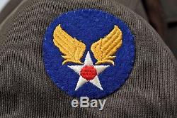 WWII U. S. ARMY AIR CORPS 8th AIR FORCE 1st LIEUTENANT'S IKE JACKET withINSIGNIA