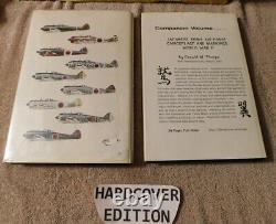 LOT DE 2 LIVRES HC / DJ SUR LE CAMOUFLAGE ET LES INSIGNES DE LA FORCE AÉRIENNE DE L'ARMÉE NAVALE JAPONAISE DE LA SECONDE GUERRE MONDIALE